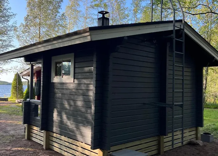 Saunamoekki Kurjenrahkan Kansallispuistossa Σαλέ *